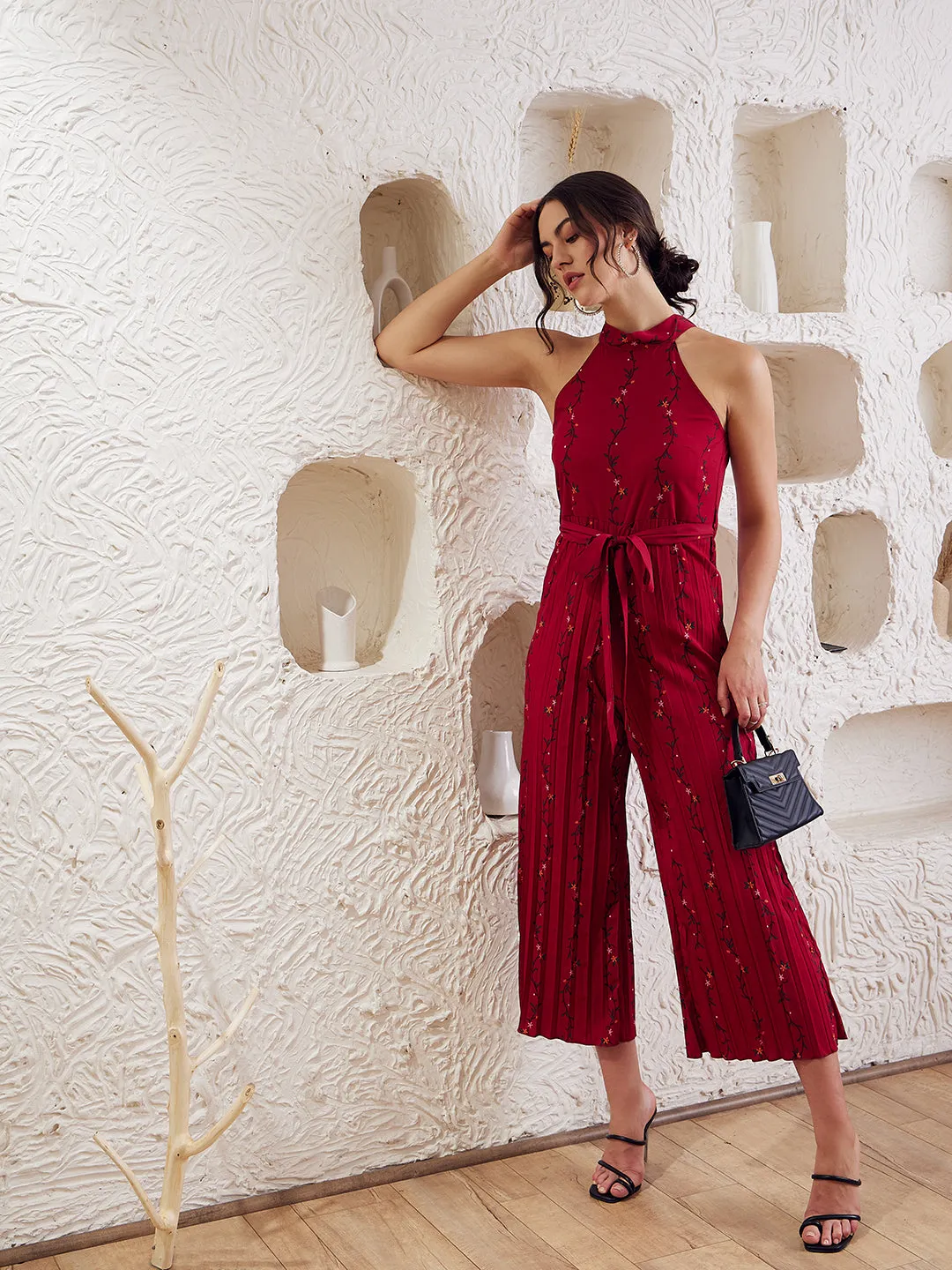 Berrylush Women Red Floral Printed Halter Neck Sleeveless Waist Tie-Up Pleated Culotte Jumpsuit